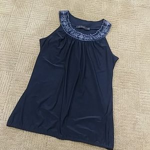 The Limited xs sleeveless top w silver design.  Like new